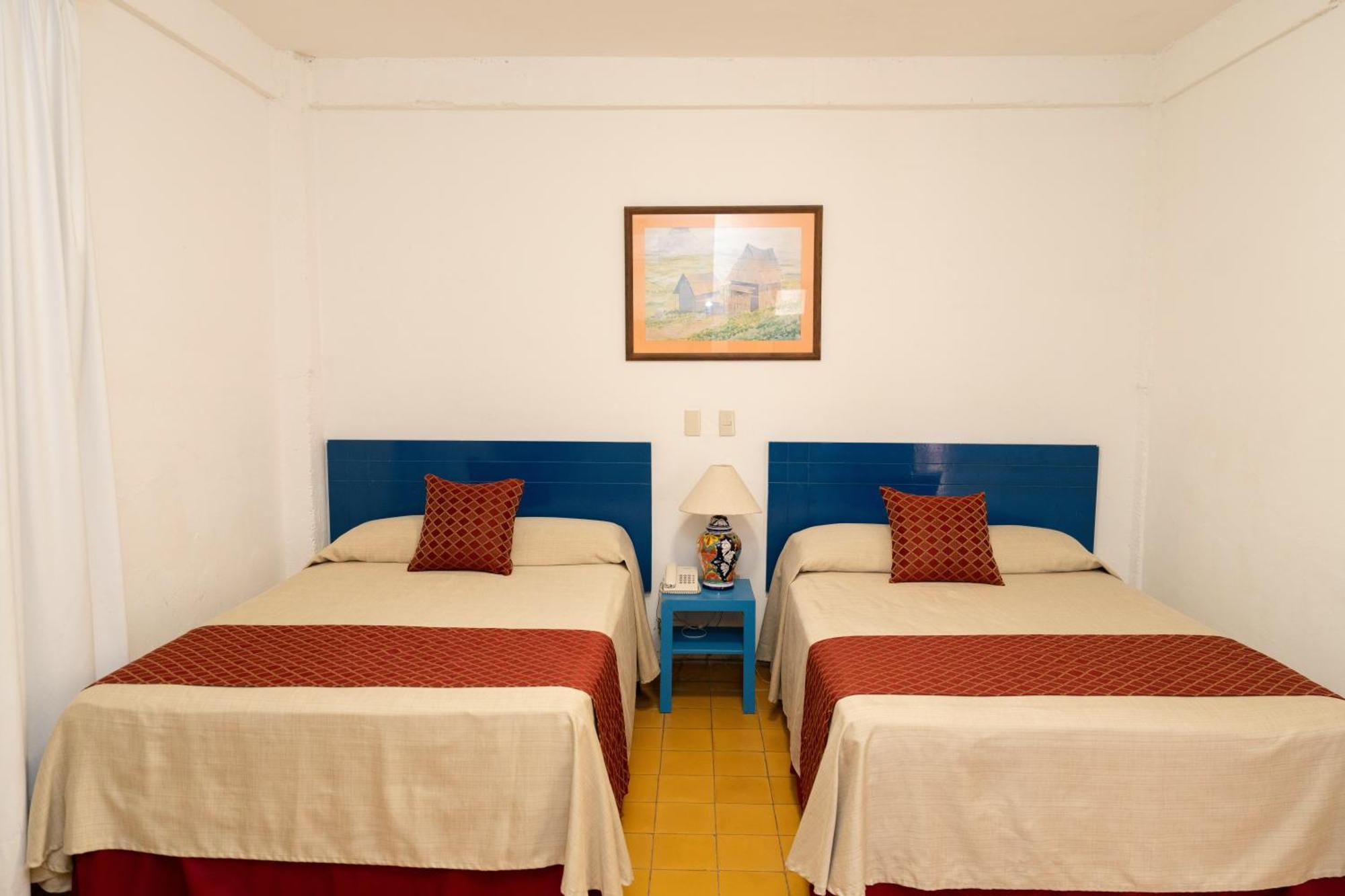 Hotel Encino Malecon Centro Пуерто-Вальярта Номер фото