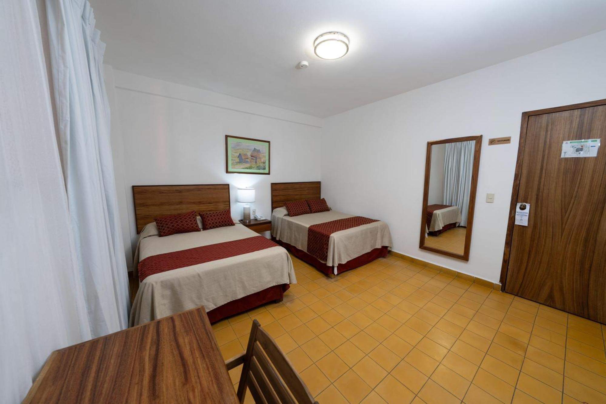 Hotel Encino Malecon Centro Пуерто-Вальярта Номер фото