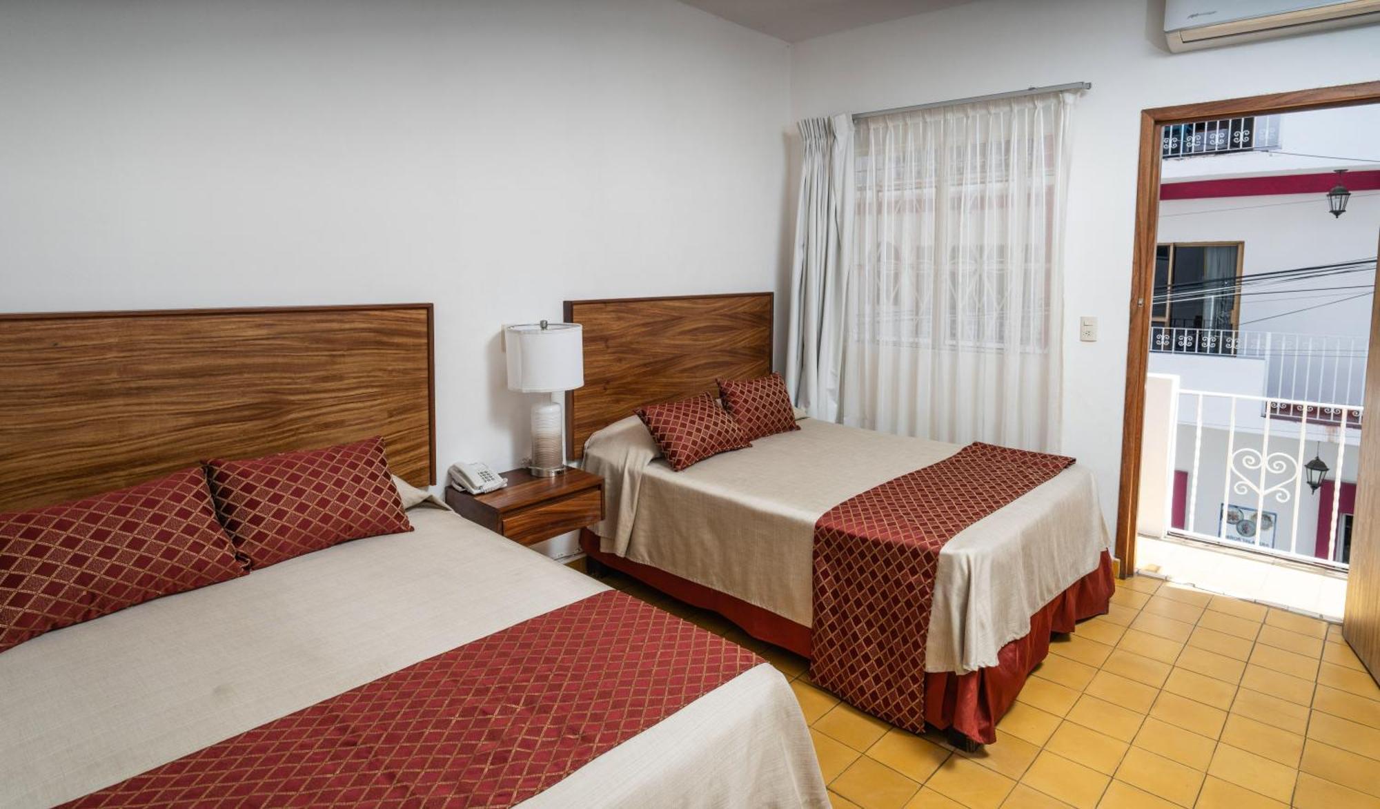 Hotel Encino Malecon Centro Пуерто-Вальярта Номер фото