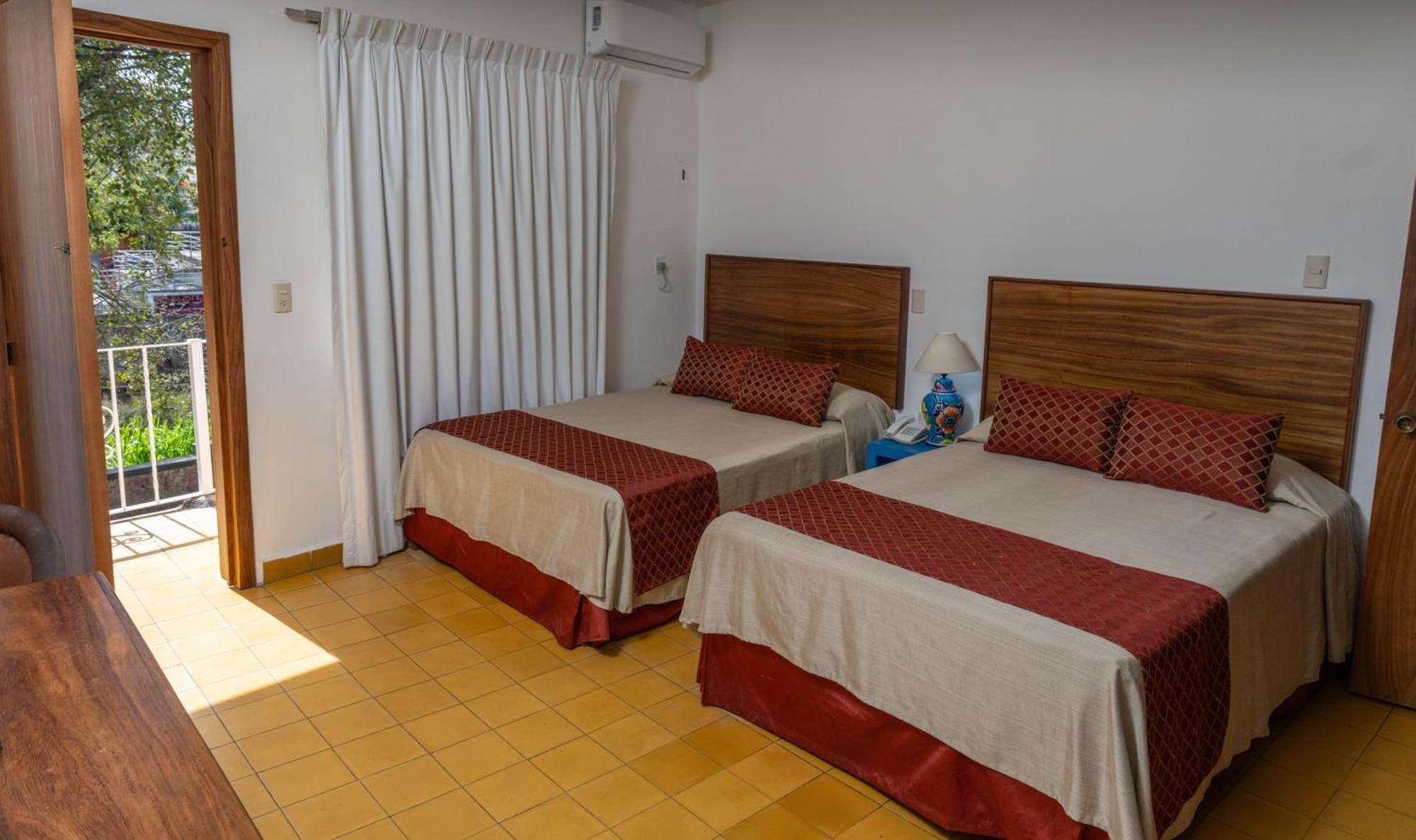 Hotel Encino Malecon Centro Пуерто-Вальярта Номер фото