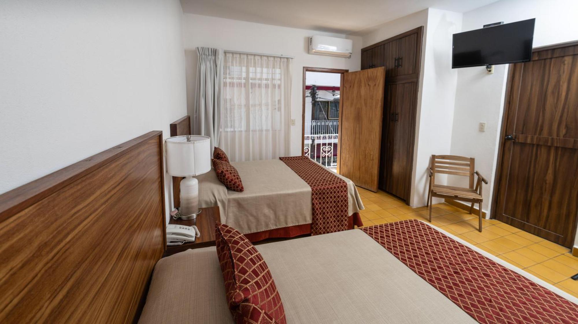 Hotel Encino Malecon Centro Пуерто-Вальярта Номер фото