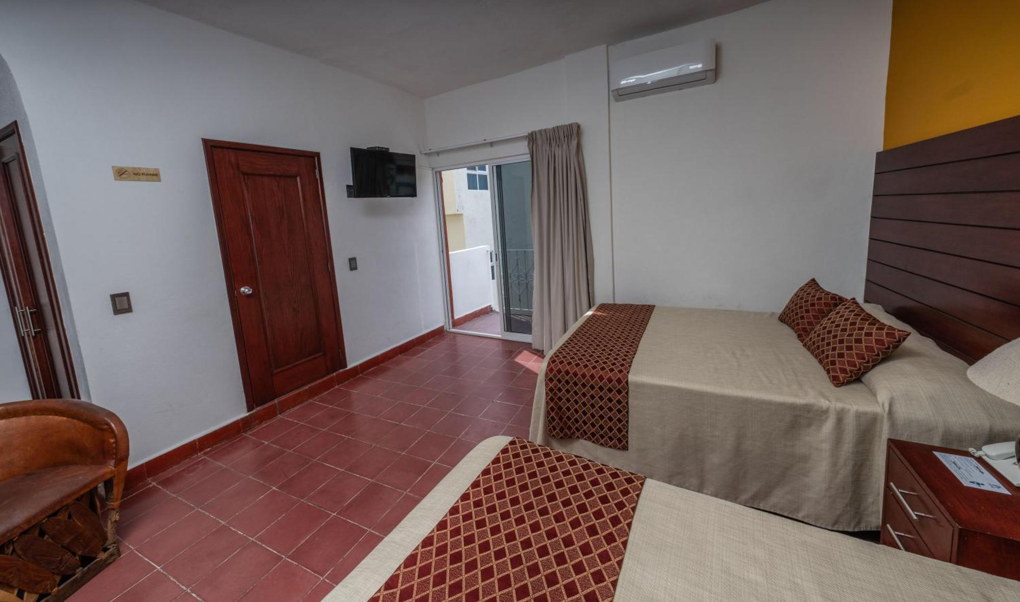 Hotel Encino Malecon Centro Пуерто-Вальярта Номер фото