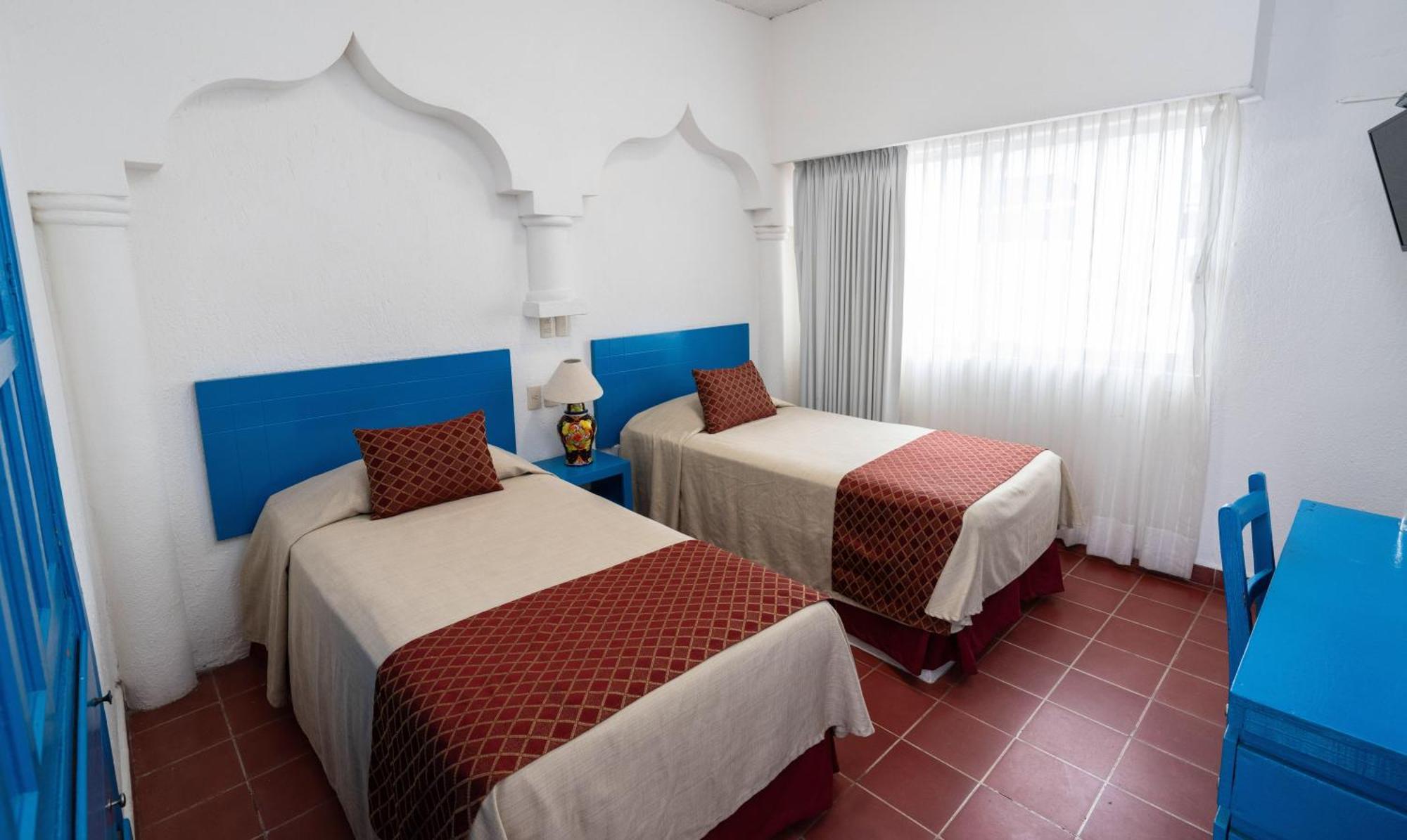 Hotel Encino Malecon Centro Пуерто-Вальярта Номер фото