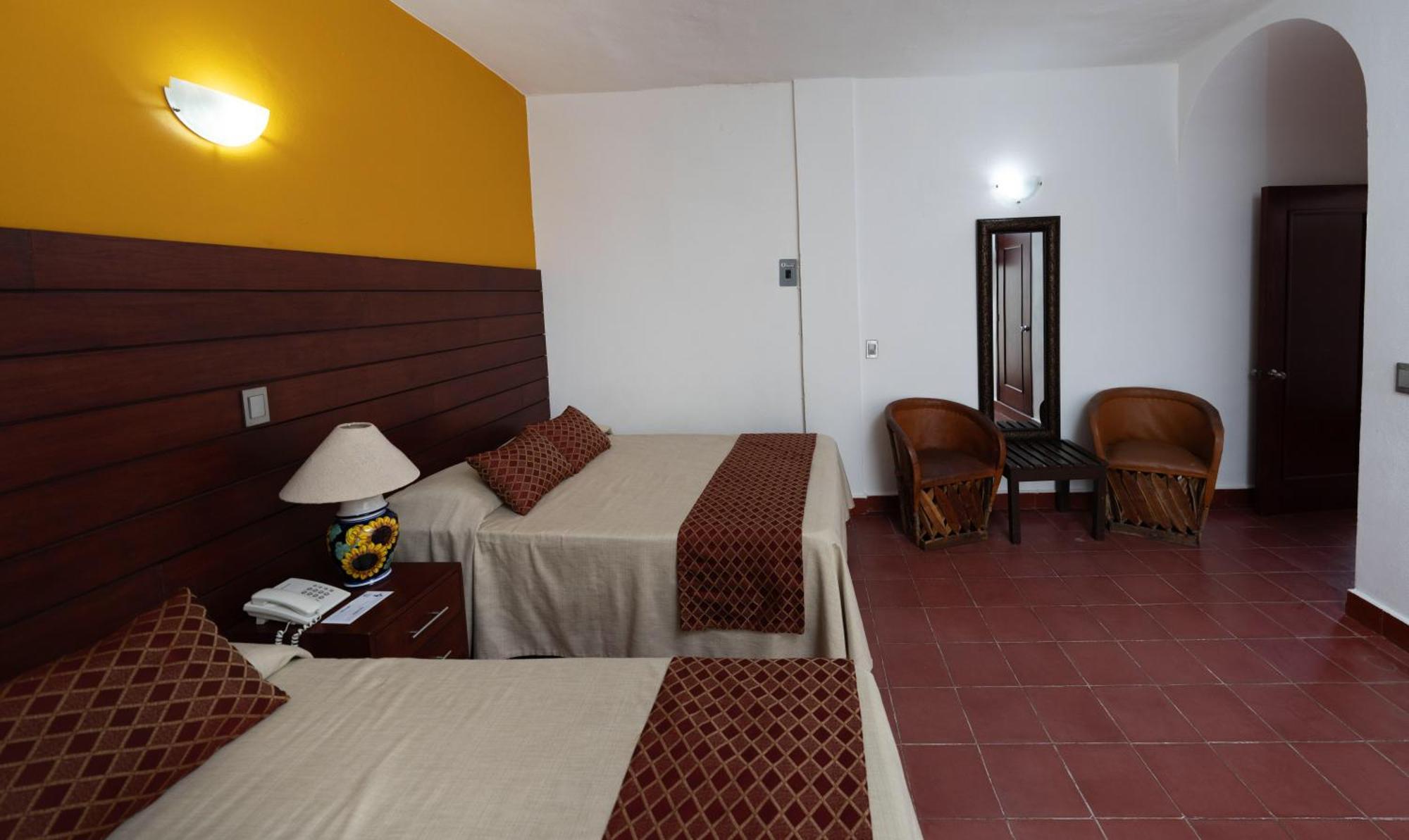 Hotel Encino Malecon Centro Пуерто-Вальярта Номер фото