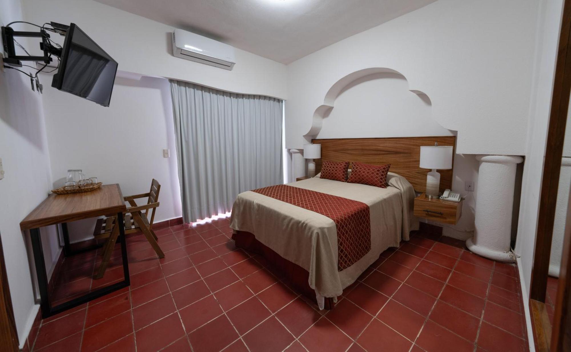 Hotel Encino Malecon Centro Пуерто-Вальярта Номер фото