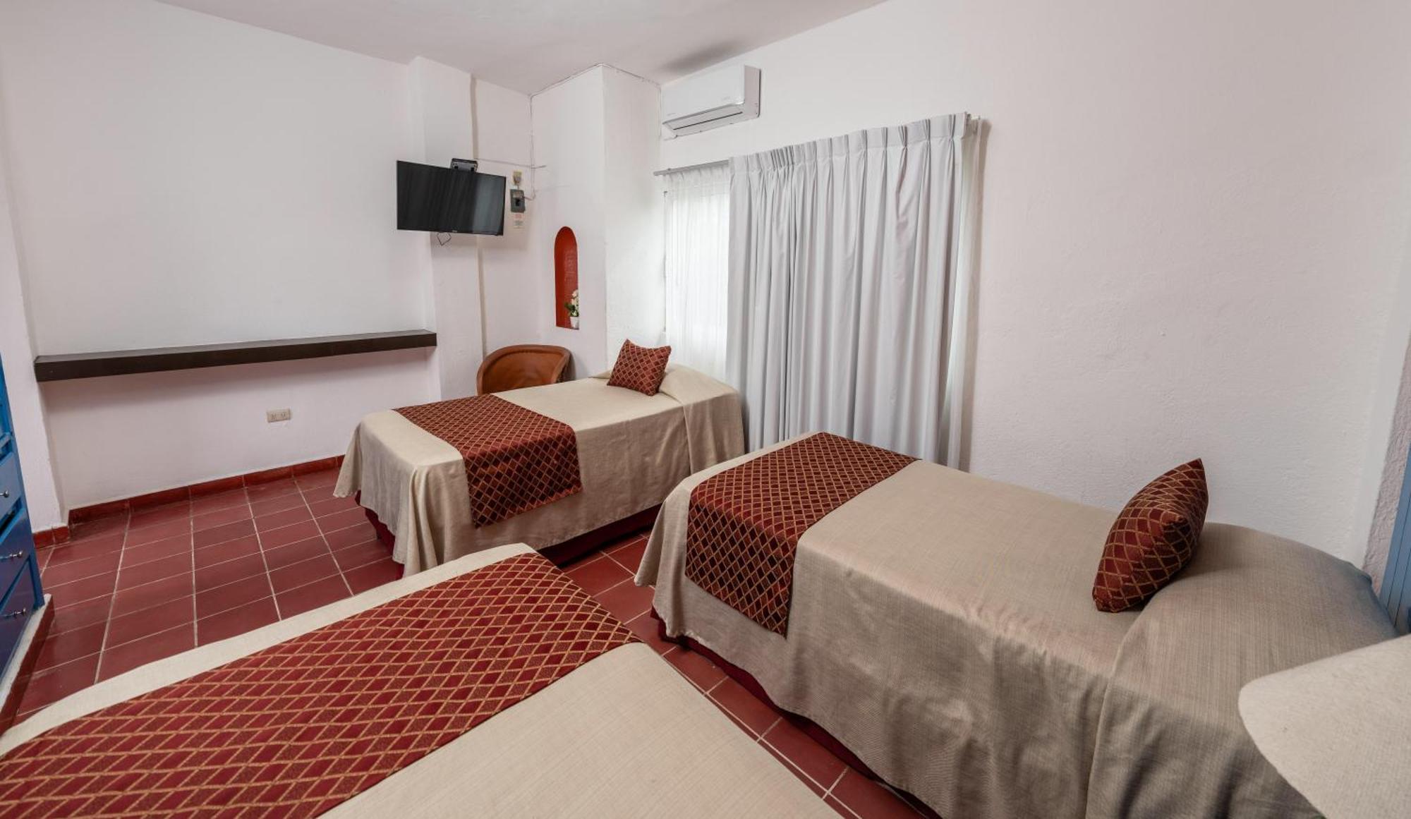Hotel Encino Malecon Centro Пуерто-Вальярта Номер фото