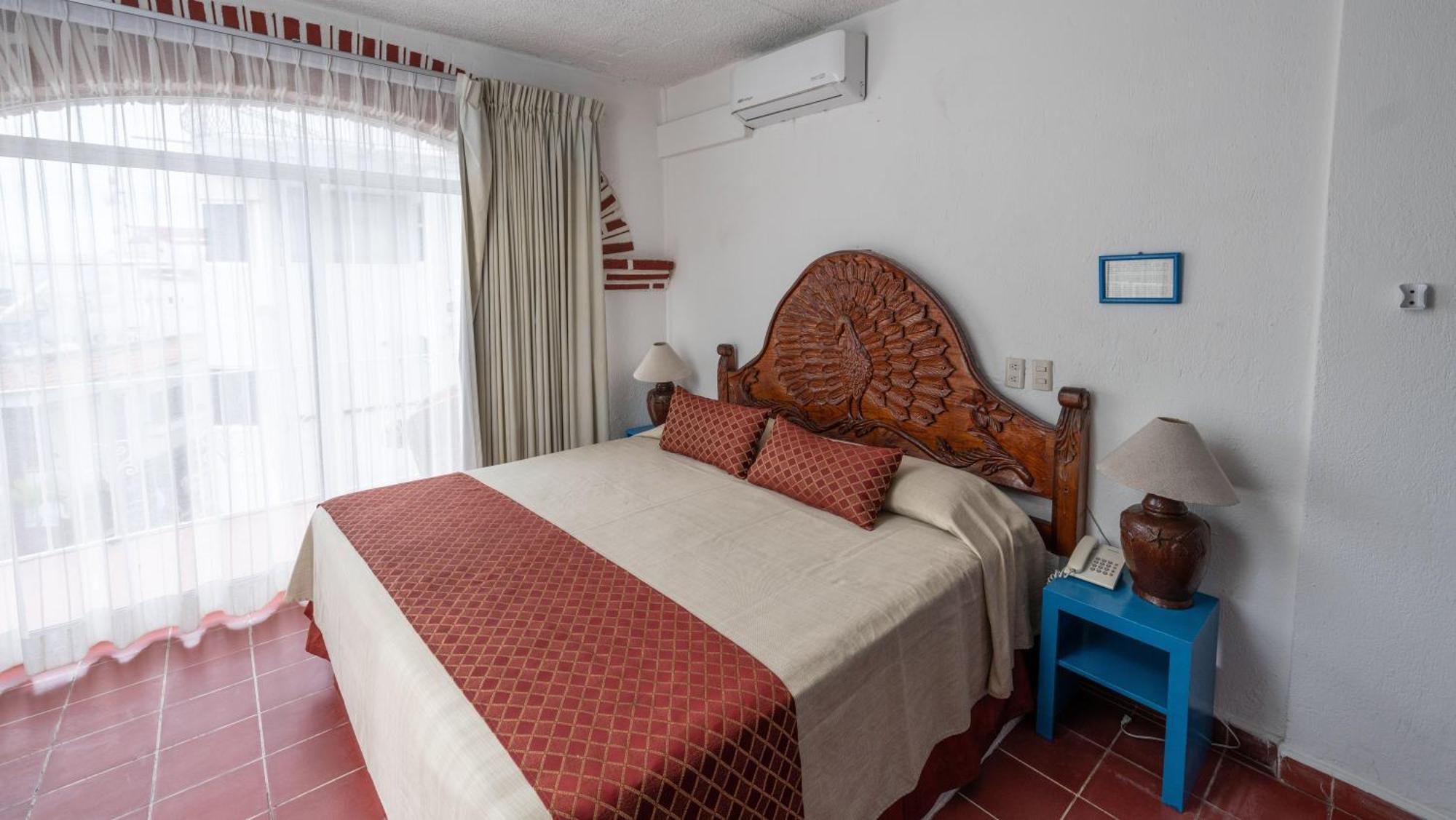 Hotel Encino Malecon Centro Пуерто-Вальярта Номер фото
