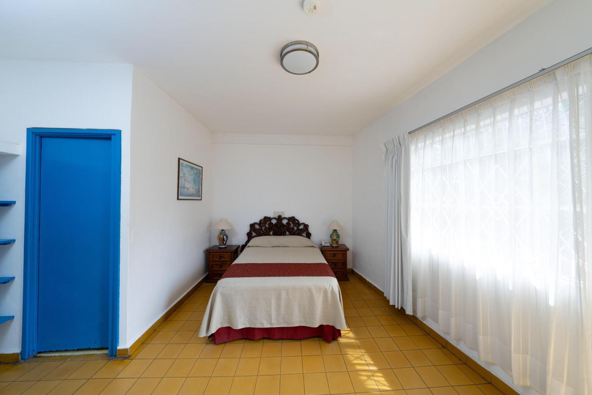 Hotel Encino Malecon Centro Пуерто-Вальярта Номер фото