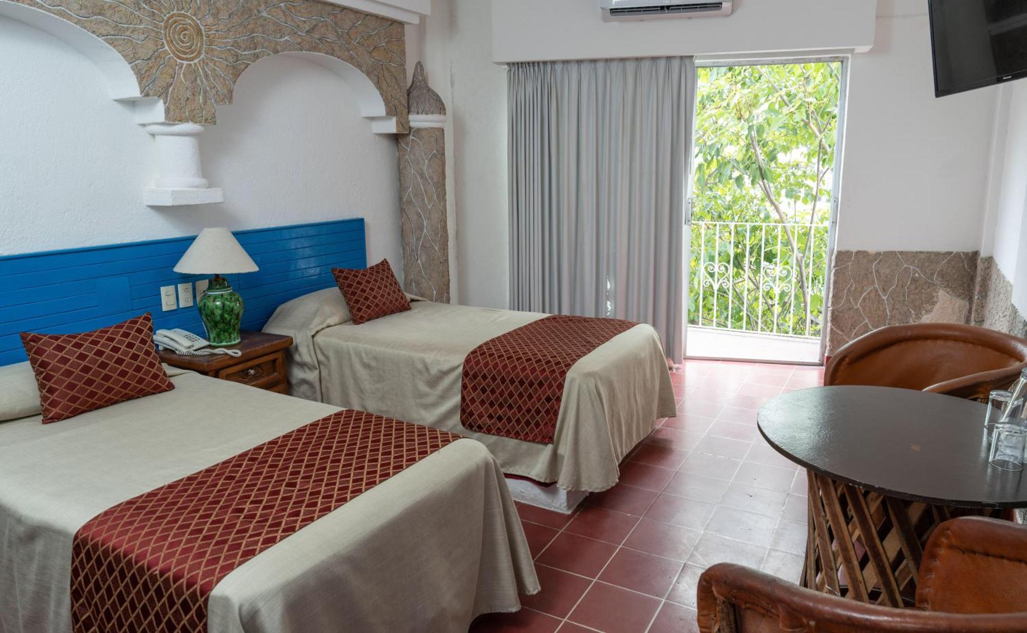 Hotel Encino Malecon Centro Пуерто-Вальярта Номер фото