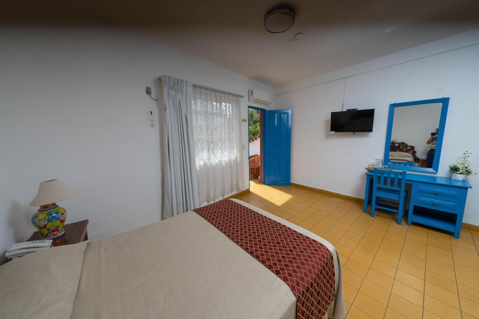 Hotel Encino Malecon Centro Пуерто-Вальярта Номер фото
