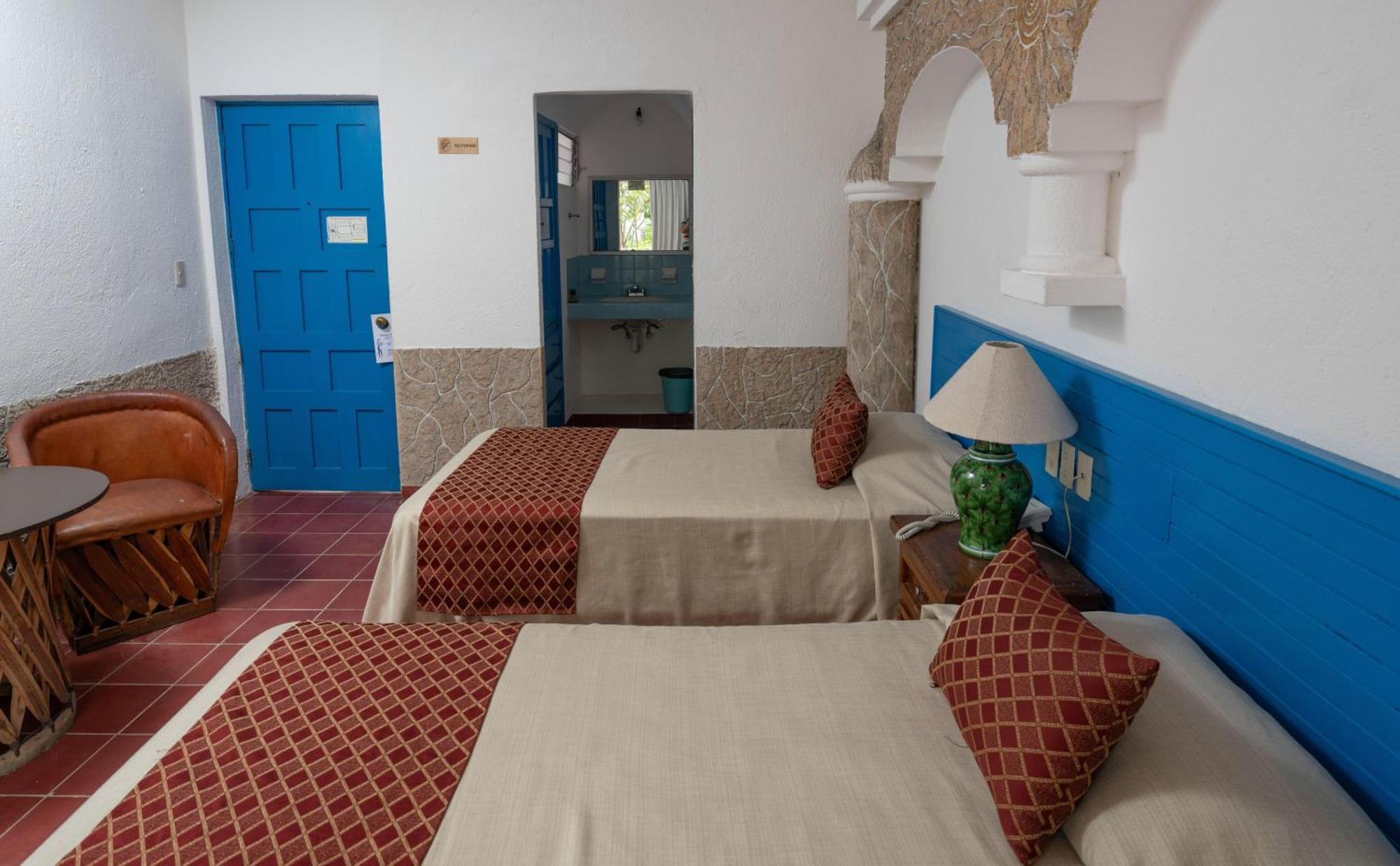 Hotel Encino Malecon Centro Пуерто-Вальярта Номер фото