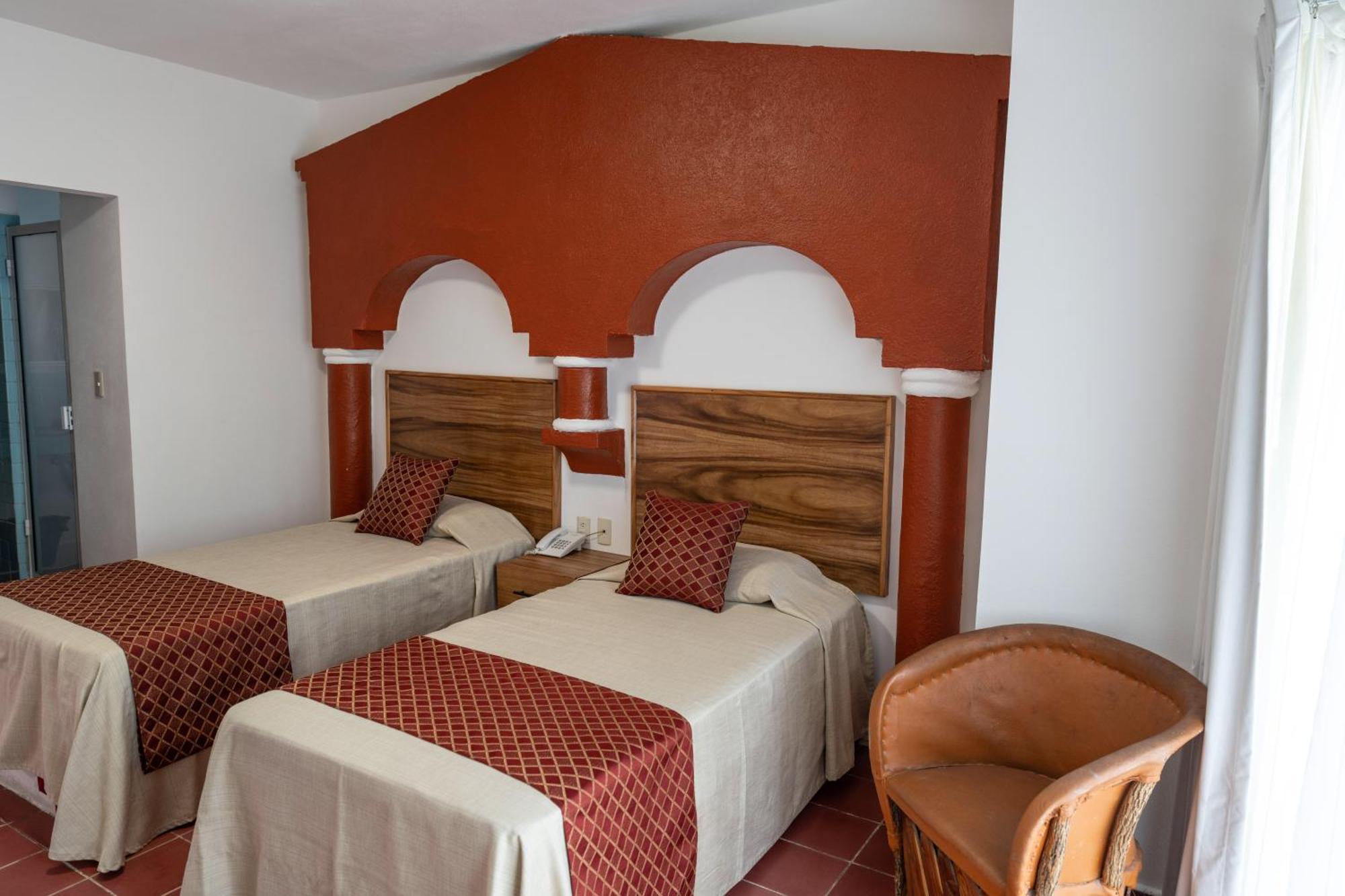 Hotel Encino Malecon Centro Пуерто-Вальярта Номер фото