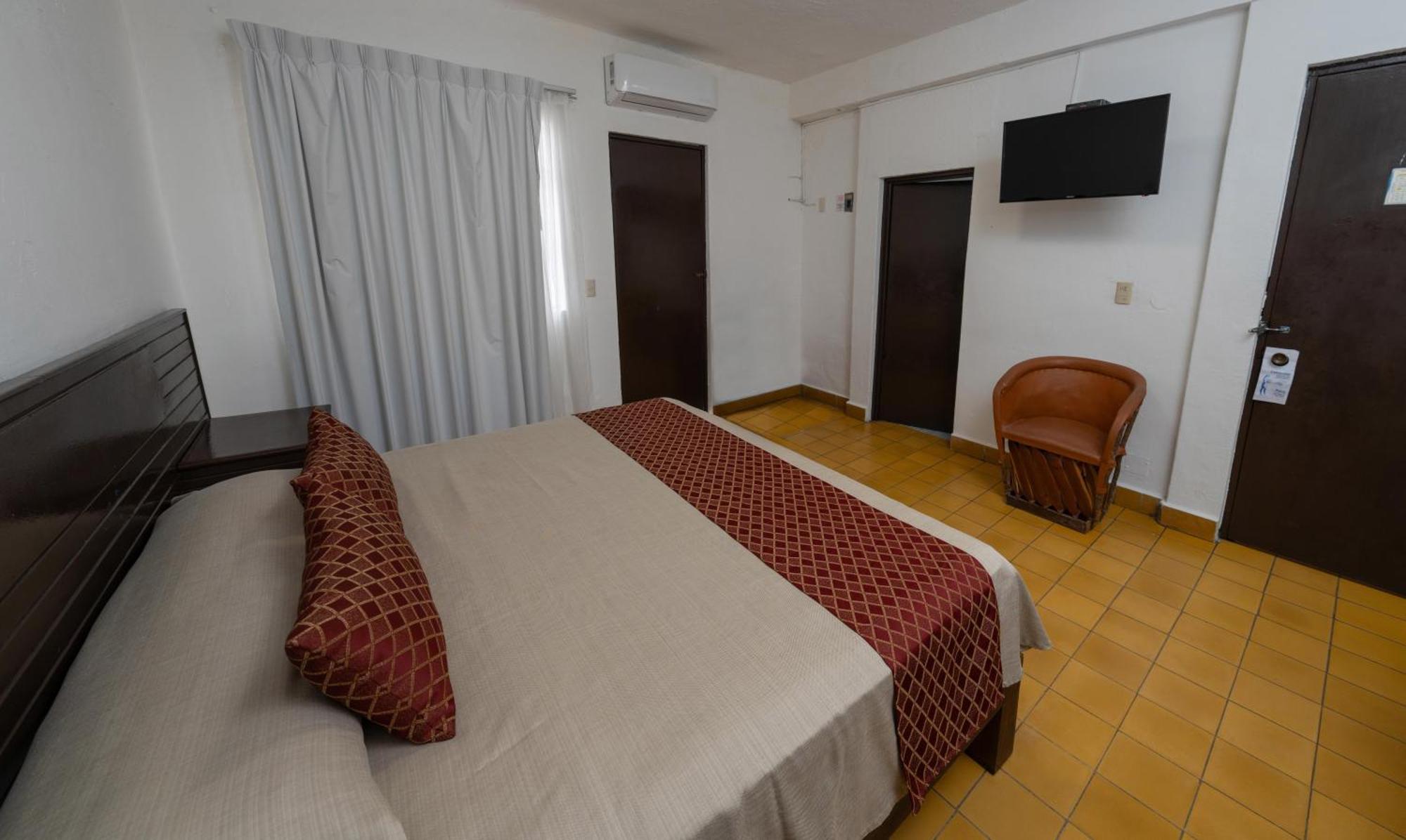 Hotel Encino Malecon Centro Пуерто-Вальярта Номер фото