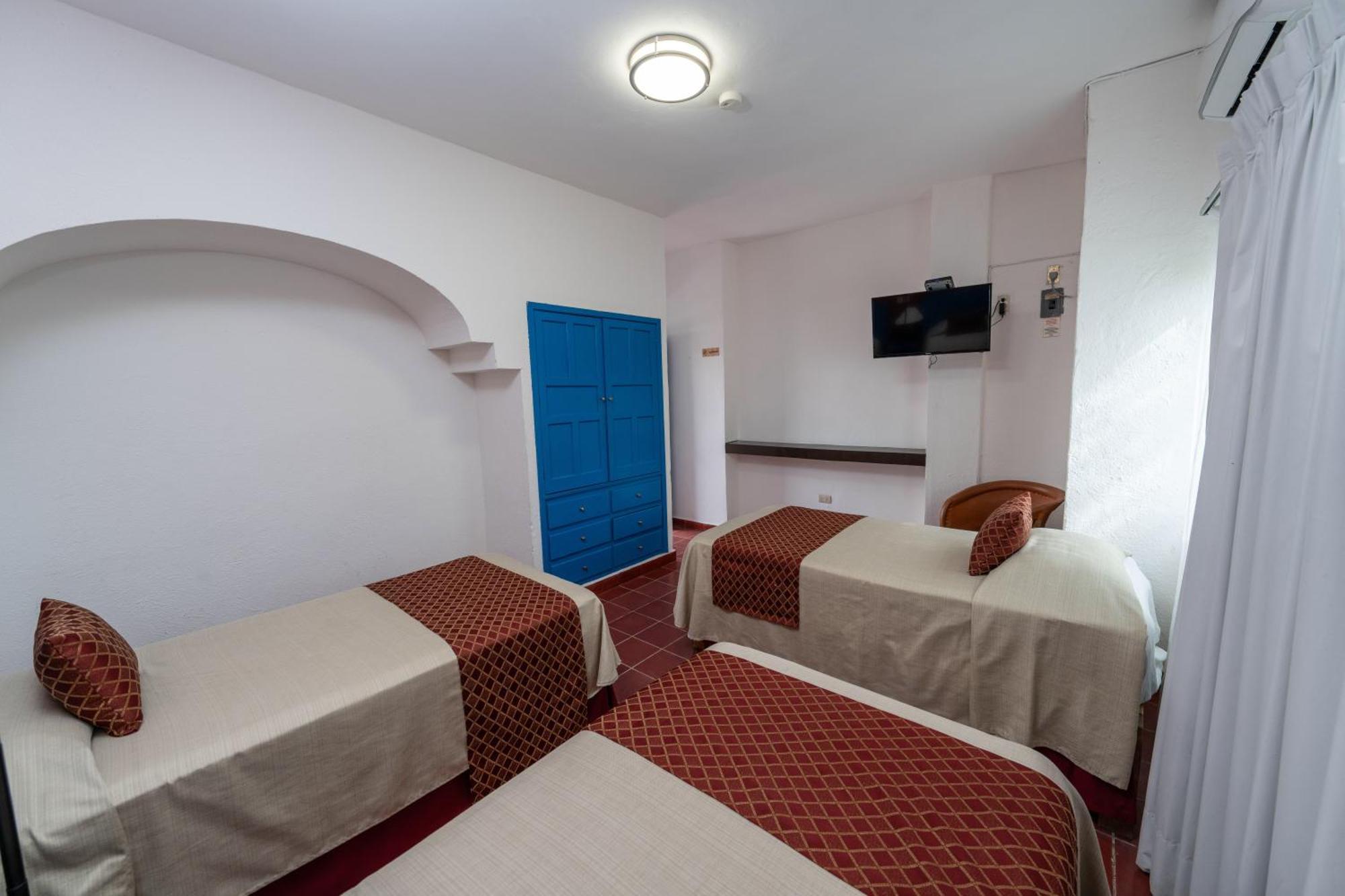 Hotel Encino Malecon Centro Пуерто-Вальярта Номер фото
