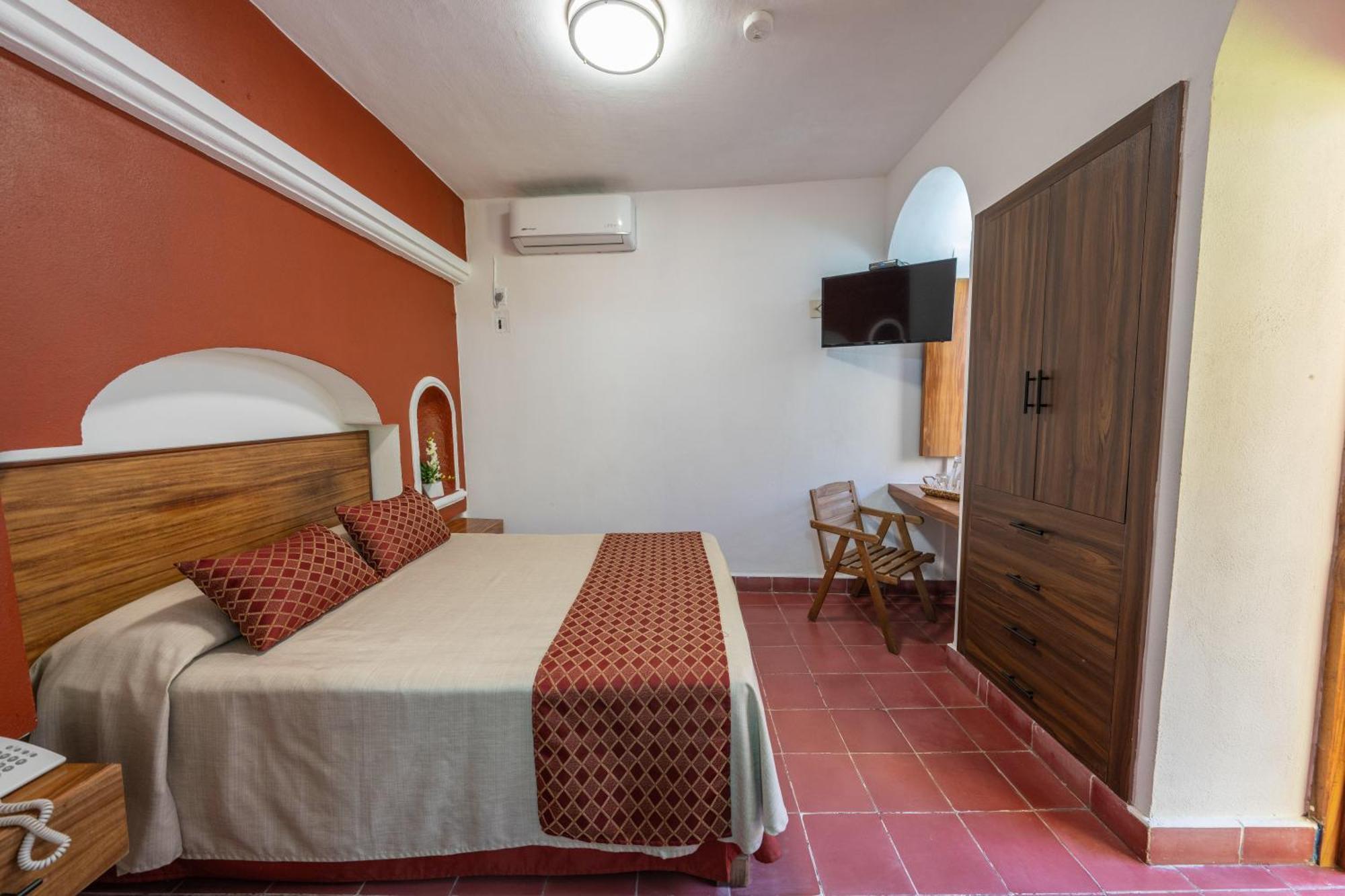 Hotel Encino Malecon Centro Пуерто-Вальярта Номер фото